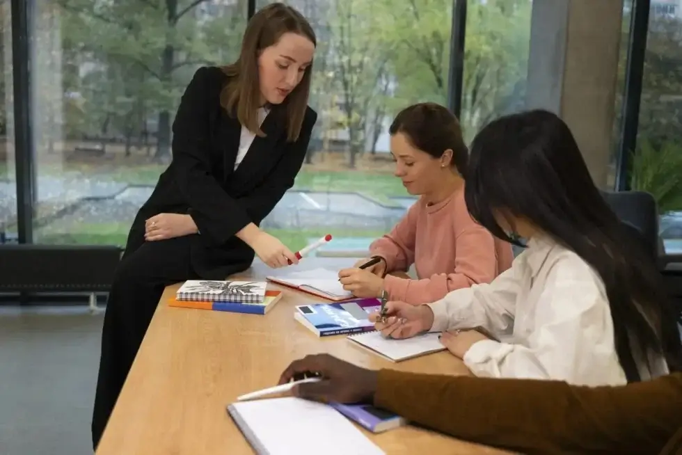 Teachers participating in a social training workshop, engaging in collaborative activities